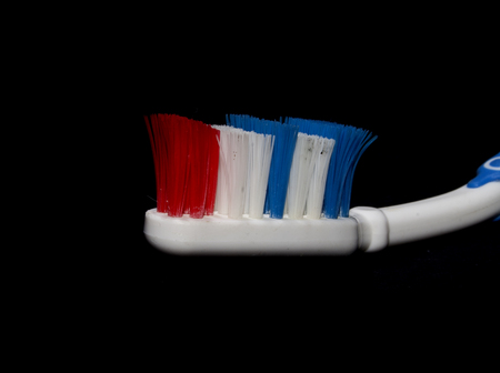 toothbrush isolated on black backgroundの写真素材