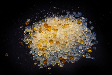 quartz sand isolated on black backgroundの写真素材