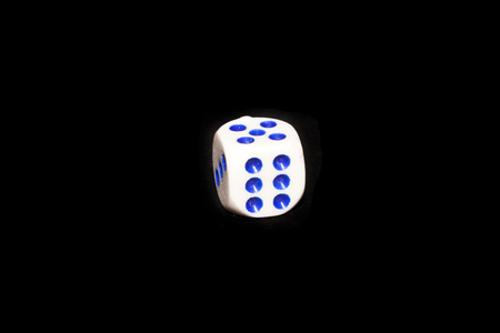 dice isolated on black backgroundの写真素材