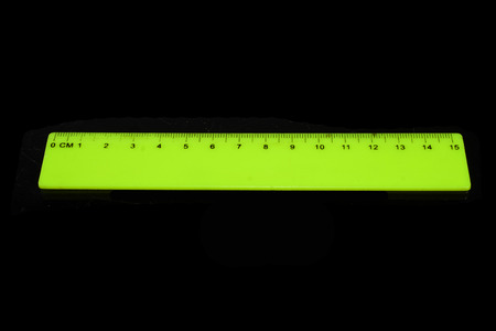 measuring ruler on a black backgroundの写真素材