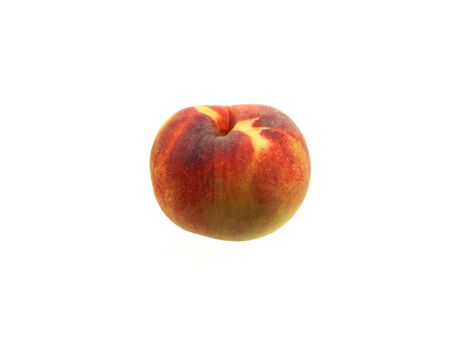peach isolated on black backgroundの写真素材
