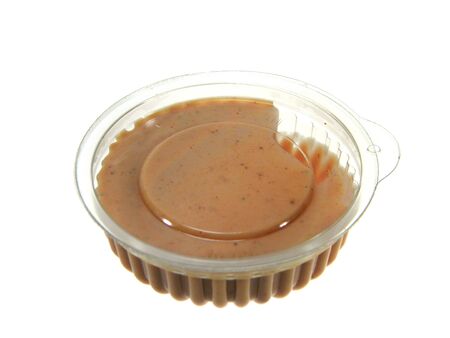 sauce in disposable dishes isolated on white backgroundの写真素材