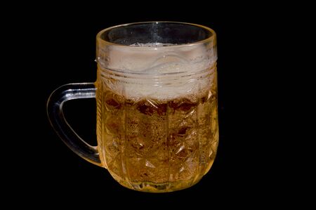 beer isolated on black backgroundの写真素材