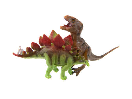 baby dinosaur toy isolated on white backgroundの写真素材