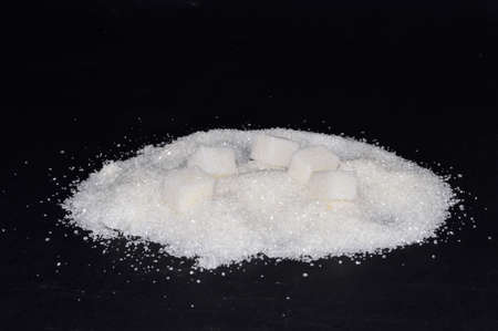 sugar isolated on black background