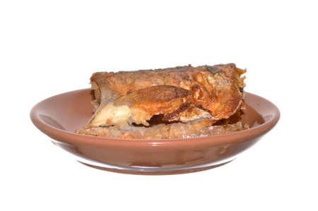 fried fish isolated on white backgroundの写真素材
