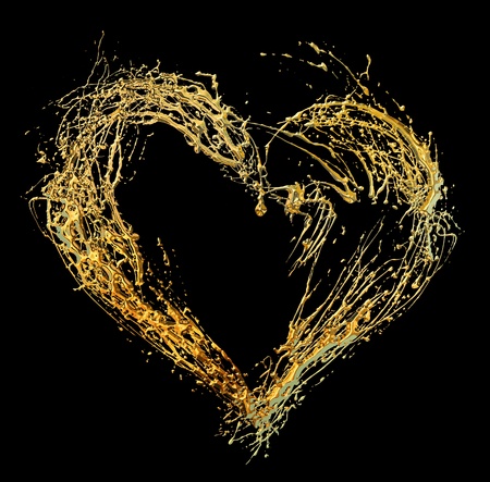 Abstract valentine's golden heart isolated on black backgroundの写真素材