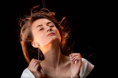 Beautiful Woman Listening Musicの写真素材