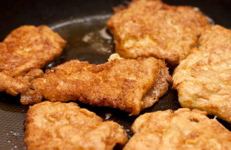 Chicken chops preparing on griddleの写真素材
