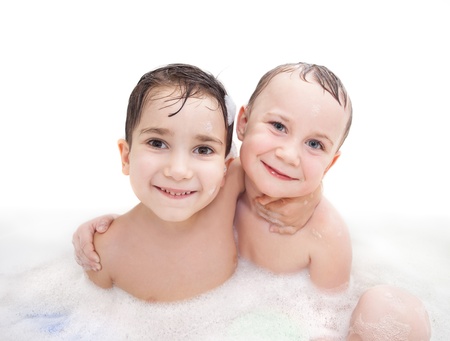 Friends. Two little boys hugging in the bathroomの写真素材