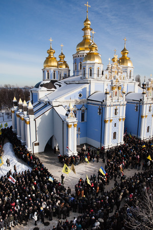 KIEV, UKRAINE - January 26, 2014: memorial service at St Michael's Cathedral on 25 year old Euromaidan activist Michail Zhiznevsky, belarusian, who was killed in the center of Kiev, Ukraine during clashes with riot police on the street Hrushevskohoのeditorial素材