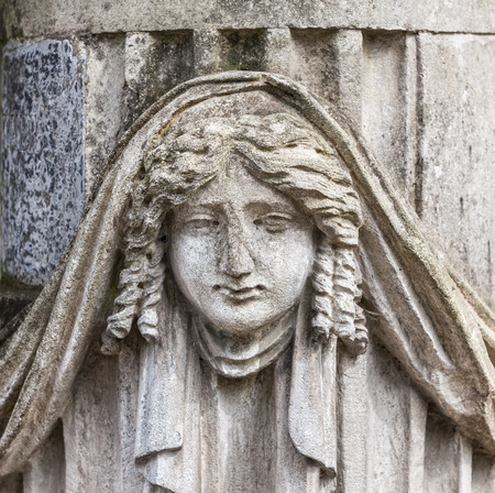 Old statue on grave in the Lychakivskyj cemetery of Lviv, Ukraine.の写真素材