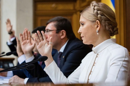 KIEV, UKRAINE - NOV 27, 2014: People's deputies of Ukraine Yuriy Lutsenko and Yulia Tymoshenko at the opening of the first session of the Verkhovna Rada of Ukraine VIII convocationのeditorial素材