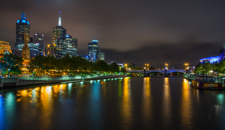 MELBOURNE, AUSTRALIA - DECEMBER 10, 2014: Melbourne skyline along the Yarra River at dusk. Melbourne is the capital and most populous city in the state of Victoria, and the second most populous city in Australiaのeditorial素材