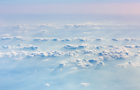 Beautiful sky with clouds, a view from an aeroplane above the clouds