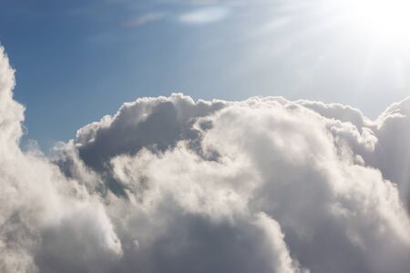 Beautiful sky with clouds, a view from an aeroplane above the clouds