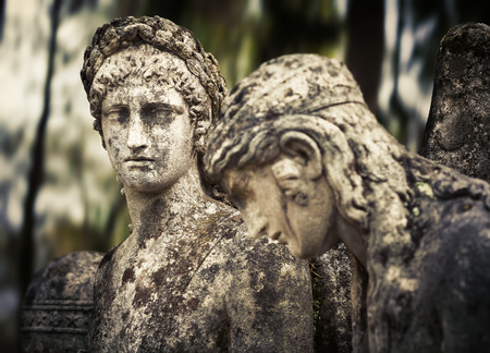 Old statue on grave in the Lychakivskyj cemetery of Lviv, Ukraine.の写真素材