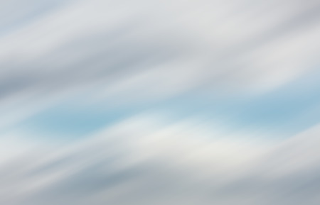 Defocused natural sky background with motion blurの写真素材