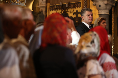 KIEV, UKRAINE - Jun 28, 2015: President of Ukraine Petro Poroshenko and his wife attended a festive liturgy at St. Vladimir Patriarchal cathedral in occasion of baptism of Kievan Rus-Ukraineのeditorial素材
