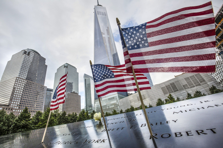 NEW YORK, USA - Sep 27, 2015: Memorial to victims of Sept. 11, 2001. Memorial at World Trade Center Ground Zero. The memorial was dedicated on the 10th anniversary of the Sept. 11, 2001 attacks.のeditorial素材