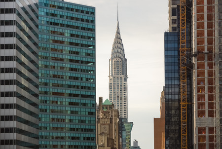 NEW YORK, USA - Sep 27, 2015: Chrysler building and manhattan modern architecture. Manhattan is the most densely populated of the five boroughs of New York Cityのeditorial素材