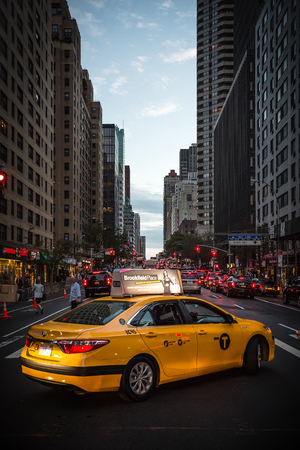 NEW YORK, USA - Sep 29, 2015: Streets of Manhattan in the evening. Manhattan is the most densely populated of the five boroughs of New York Cityのeditorial素材