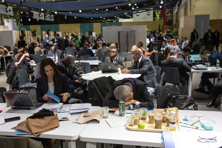 PARIS, FRANCE - Nov 30, 2015: Hard work in the press centre during the 21st session of the UN Conference on Climate Changeのeditorial素材