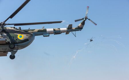 KIEV REG, UKRAINE - Mar 26, 2016: Armed forces of Ukraine. Ukrainian military helicopter during the execution of the training combat missionのeditorial素材