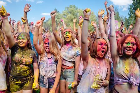 KIEV, UKRAINE - Jun 25, 2016: Crowd of happy young people have fun in colors during festival of colors ColorFestのeditorial素材