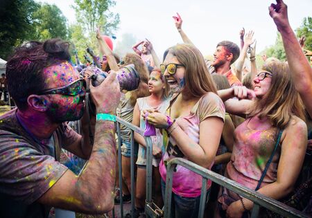 KIEV, UKRAINE - Jun 25, 2016: Crowd of happy young people have fun in colors during festival of colors ColorFestのeditorial素材