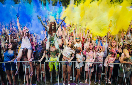 KIEV, UKRAINE - Jun 25, 2016: Crowd of happy young people have fun in colors during festival of colors ColorFestのeditorial素材