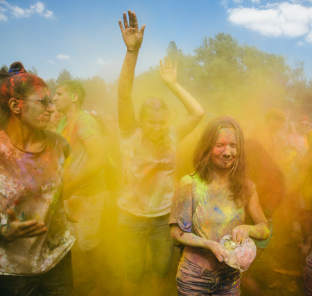 KIEV, UKRAINE - Jun 25, 2016: Crowd of happy young people have fun in colors during festival of colors ColorFestのeditorial素材