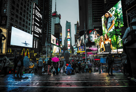 NEW YORK, USA - Apr 30, 2016: Times Square in the eveningin. imes Square is a major commercial...