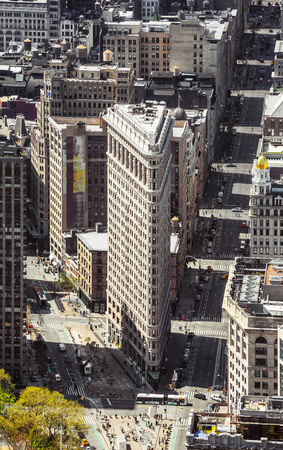 NEW YORK, USA - Apr 27, 2016: Flatiron Building at NYC. Originally the Fuller Building, is a triangular steel-framed landmarked building located at 175 Fifth Avenue in the borough of Manhattanのeditorial素材