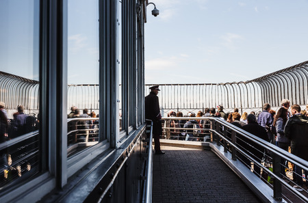 NEW YORK, USA - Apr 30, 2016: Tourists enjoying the breathtaking views of New York City from the observation deck of Empire State Buildingのeditorial素材