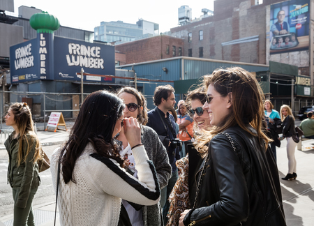 NEW YORK, USA - Apr 30, 2016: Group of young women having fun talking on the streets of New York City. Manhattan street scene. The Americans on the streets of NYCのeditorial素材