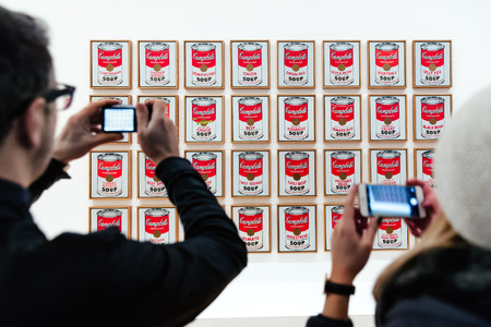 NEW YORK, USA - May 01, 2016: People inside Museum of Modern Art. MoMAs collection offers an overview of modern and contemporary art, architecture, design, drawing, painting, sculpture, photographyのeditorial素材