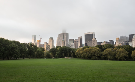 Early morning in New York City Central Park with Manhattan skyline and skyscrapersのeditorial素材