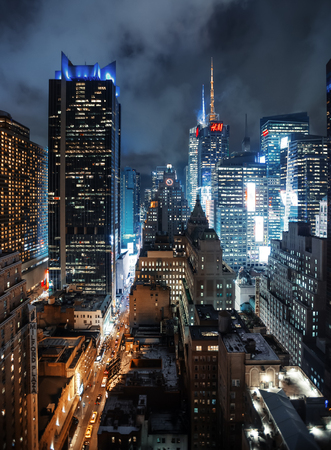 NEW YORK, USA - Sep 20, 2016: Streets of Manhattan at night. Manhattan is the most densely populated of the five boroughs of New York Cityのeditorial素材