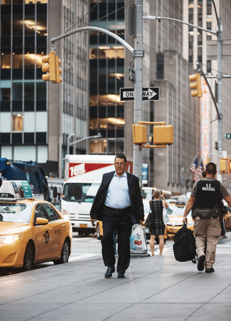 NEW YORK, USA - Sep 21, 2016: Manhattan street scene. Americans on the streets of New York City in evening timeのeditorial素材