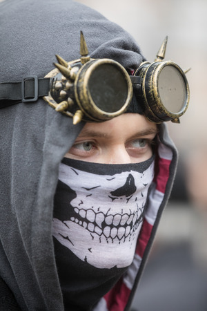 KIEV, UKRAINE - Oct 30, 2016: Zombie Walk. Young people taking part in a zombie parade in the streets of Kiev, to celebrate Halloween.
Street performer in Halloween costume and makeup.のeditorial素材