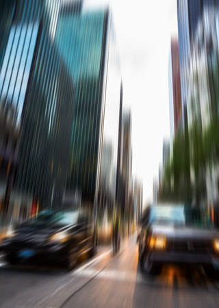 Streets of Manhattan. Abstract blurred image of modern New York City architectureの写真素材