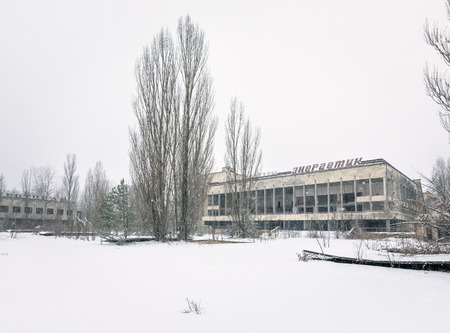 CHERNOBYL REG, UKRAINE - Nov 29, 2016: Chernobyl Exclusion Zone. Lost city. Ruins of buildings in the abandoned city of Pripyat. Winter in zone of exclusion. Zone of high radioactivityのeditorial素材