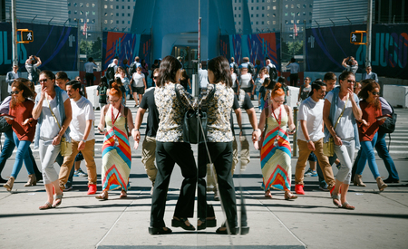 NEW YORK, USA - Sep 22, 2016: Manhattan reflections street scene. New York and New Yorkers. Americans on the streets of NYCのeditorial素材