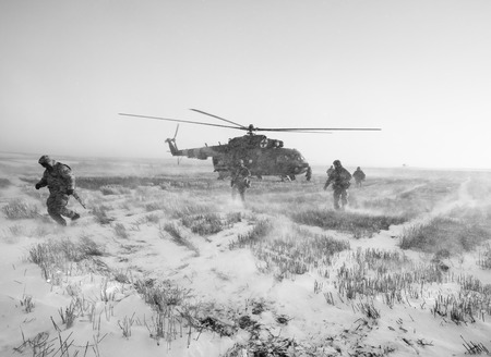 DONETSK REGION, UKRAINE - Dec 05, 2016: Ukrainian army helicopter during a combat mission in the area of the antiterrorist operation in the Donetsk regionのeditorial素材