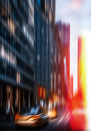 Streets of Manhattan at night. Illumination and night lights of New York City. Intentional motion blurの写真素材