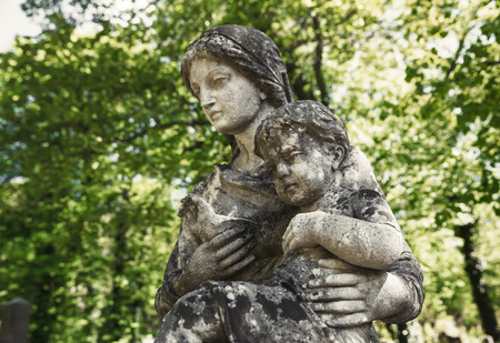 LVIV, UKRAINE - Apr 27, 2016: Old statue on grave in the Lychakivskyj cemetery of Lviv, Ukraine. Officially State History and Culture Museum-Preserve - Lychakiv Cemeteryのeditorial素材