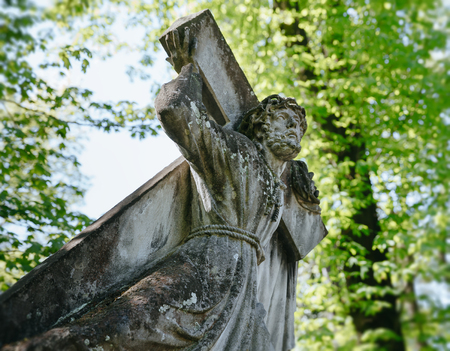 LVIV, UKRAINE - Apr 27, 2016: Old statue on grave in the Lychakivskyj cemetery of Lviv, Ukraine. Officially State History and Culture Museum-Preserve - Lychakiv Cemeteryのeditorial素材