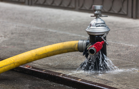 NEW YORK, USA - May 02, 2016: Fire hydrant on streets of Manhattan. Fire Department of NYC provides fire protection, technical rescue, primary response to biological, chemical hazards ets.のeditorial素材