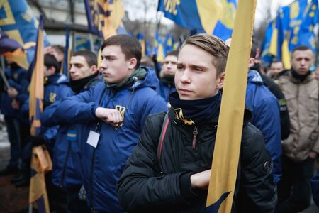 KIEV, UKRAINE - Feb 22, 2017: Activists of nationalist groups during the March of National Dignity to honor protesters who were killed during pro-European Maidan demonstrations in 2013-14のeditorial素材